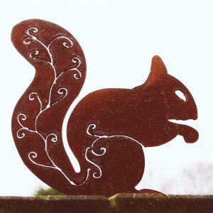 rusty steel red squirrel with scroll pattern tail
